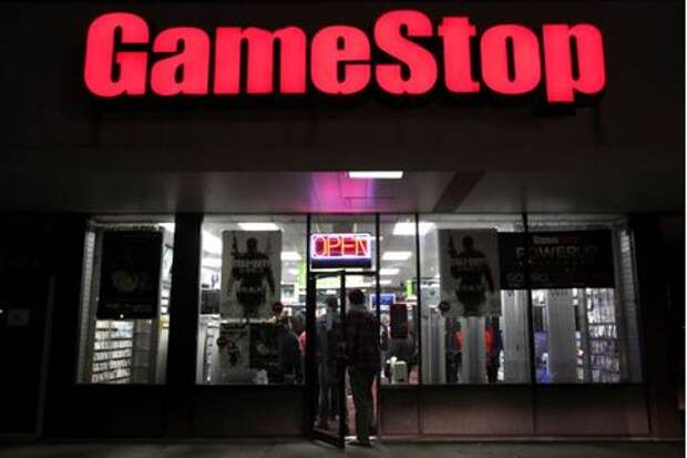 People enter a GameStop store during "Black Friday" sales in Carle Place, New York November 25, 2011. REUTERS/Shannon Stapleton