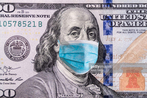 100 dollar banknote with medical mask