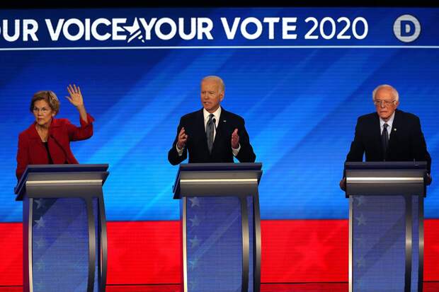 Elizabeth Warren, Joe Biden, and Bernie Sanders | Photo Credits: John Tlumacki/The Boston Globe via Getty Images