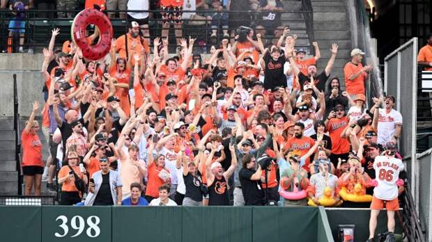 Baltimore Orioles fans in the outfield stands at Camden Yards.