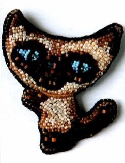 Брошки котики