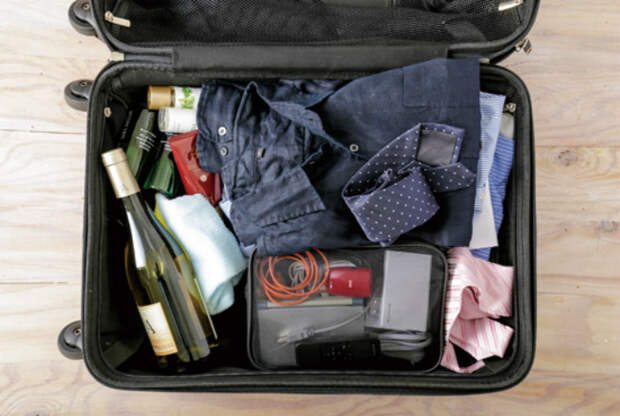 Правильно упаковать чемодан. | Фото: 360.life.