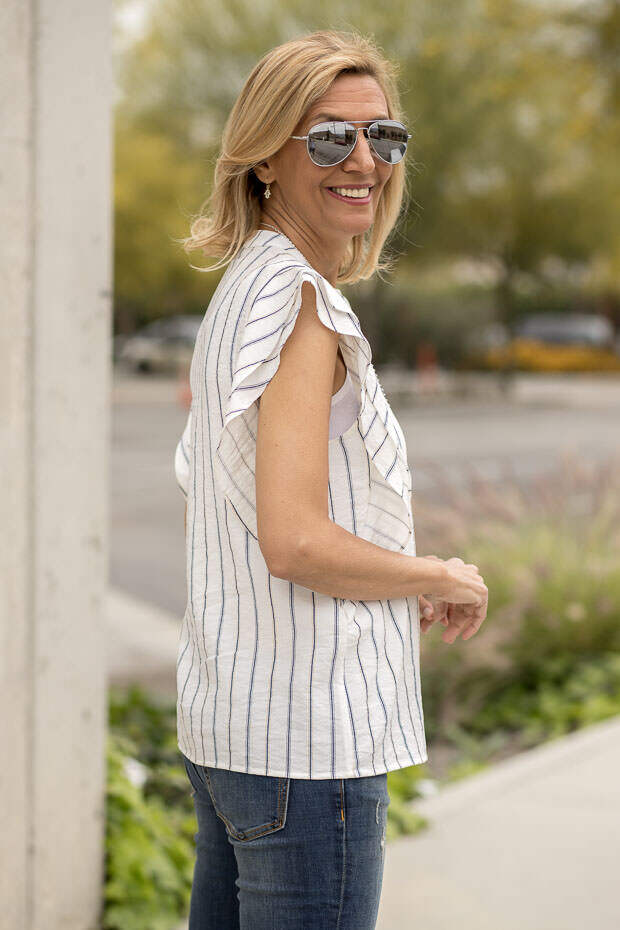 stripe sleeveless shirt with ruffle detail