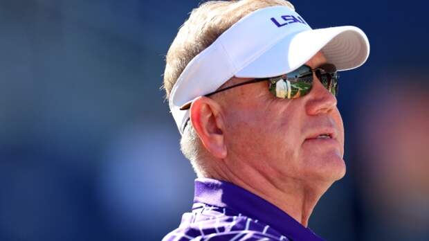Brian Kelly watches on during an LSU football game.