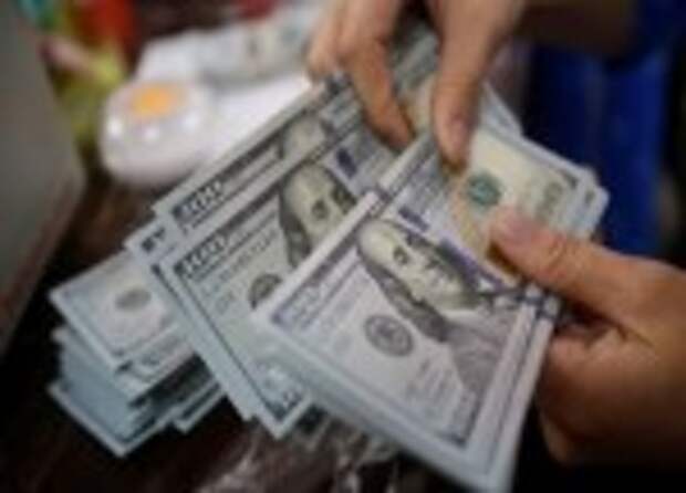 ЦБ РФ установил курс доллара США с 15 июля в размере 74,1236 руб.