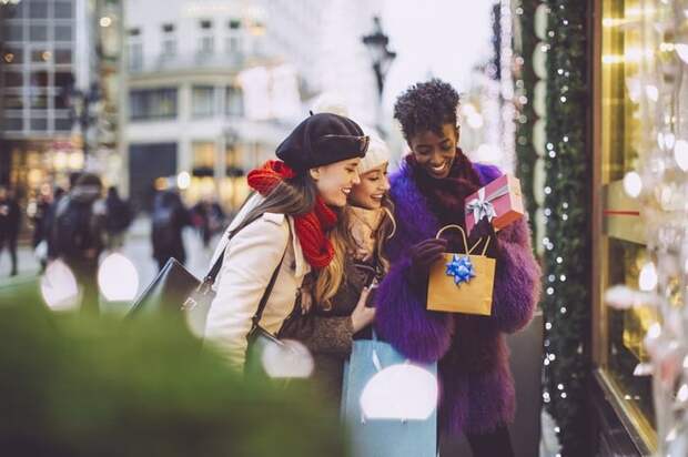 Friends shopping in the city for holiday gifts.