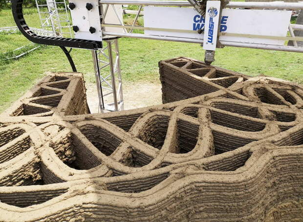 Напечатанный на 3D-принтере дом из глины в Италии