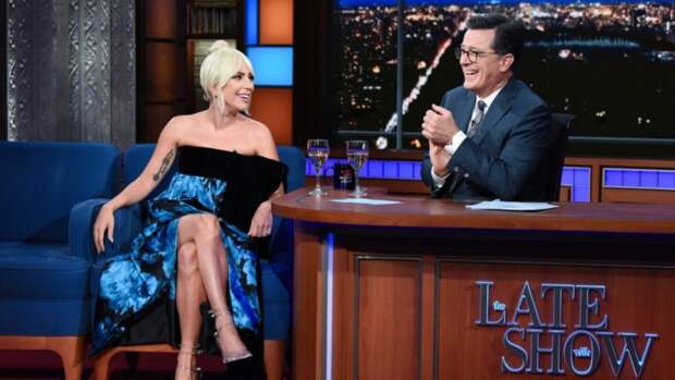 The 'Star Is Born' star also sat down with Stephen Colbert to discuss her new film, Bradley Cooper's singing voice, and the differences between her and her character.