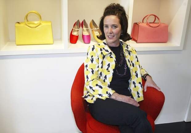 FILE - In this May 13, 2004, file photo, designer Kate Spade sits during an interview in New York. Spade is being buried in Kansas City, where she was