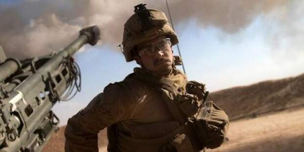 Американские морские пехотинцы стреляют из гаубицы в Сирии. Фото / Корпус морской пехоты США