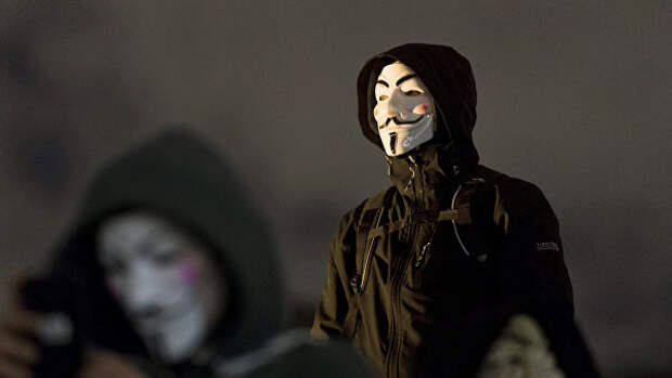 Участники акции протеста, организованной движением Anonymous