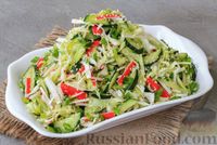 Фото к рецепту: Салат из капусты с крабовыми палочками и огурцами