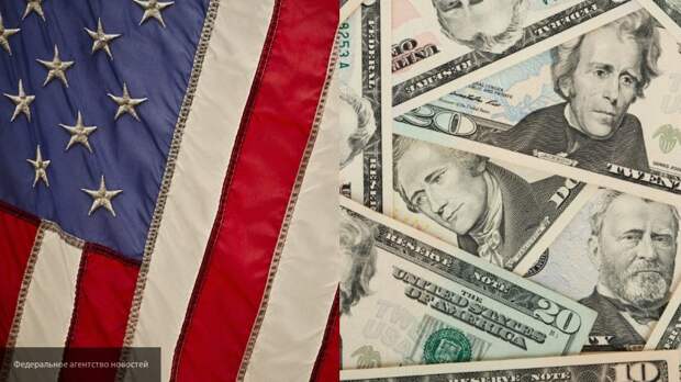 Политолог назвал уход от доллара в экономике ответом РФ на информационную войну США