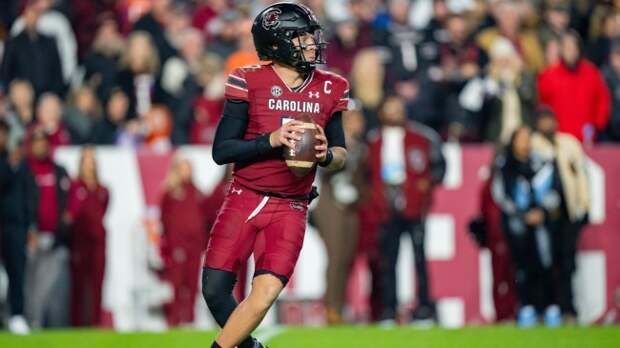 Spencer Rattler drops back to throw a pass during a game between Clemson and South Carolina.
