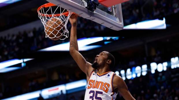 Kevin Durant slam dunks.