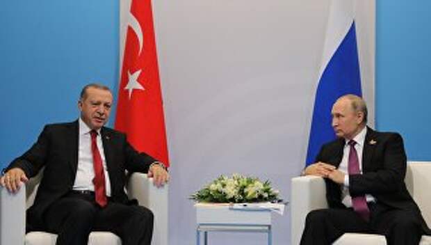 Президент РФ Владимир Путин и президент Турции Реджеп Тайип Эрдоган во время беседы на полях саммита лидеров Группы двадцати G20 в Гамбурге. 8 июля 2017