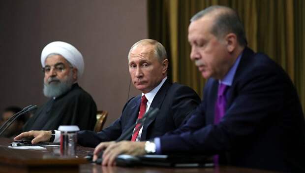 Владимир Путин, президент Ирана Хасан Рухани и президент Турции Реджеп Тайип Эрдоган во время совместного заявления для прессы по итогам встречи. 22 ноября 2017