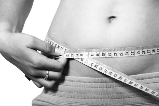 11707-a-woman-measuring-her-belly-or-1024x682