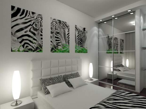 Интерьер черно-белой спальни, декор спальни, постеры и черно-белое покрывало зебра