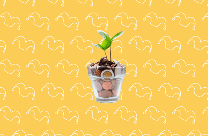 A pot of change with a plant growing out of it