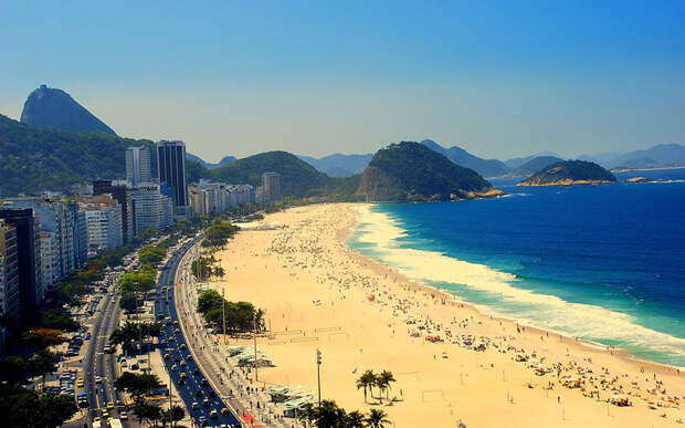 Sunbathing In The Famous Beach Of Rio De Janeiro, Brazil