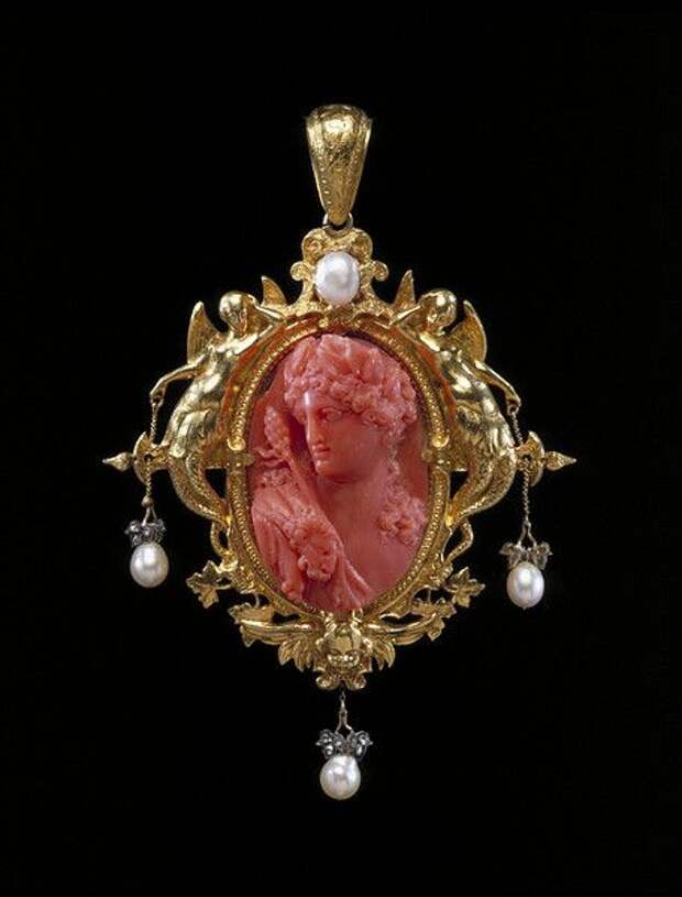 1854 Bacchus pendant - Coral, carved as a cameo, and set in a gold frame hung with pearls and rose-cut diamond sparks set in silver.