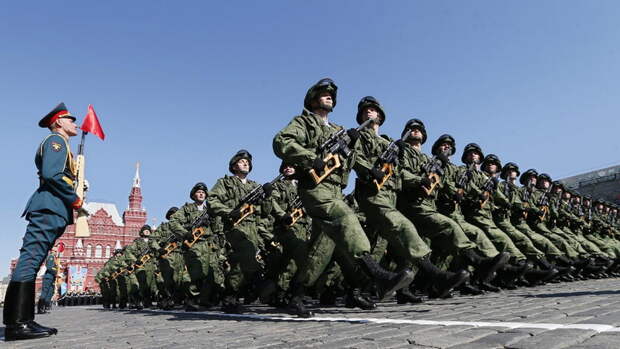 Vladimir Putin attends a military parade in Moscow