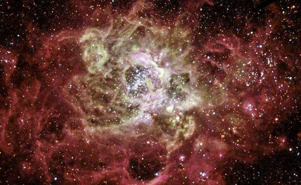 NGC 604 Туманность NGC 604 составлена из более чем 200 невероятно горячих солнц. Космический телескоп Хаббл захватил блестящую флуоресценцию туманности, вызванную ионизованным водородом.