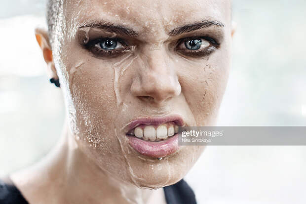 Woman crying under the rain