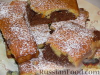 Фото к рецепту: Шоколадно-апельсиновый кекс с орехами