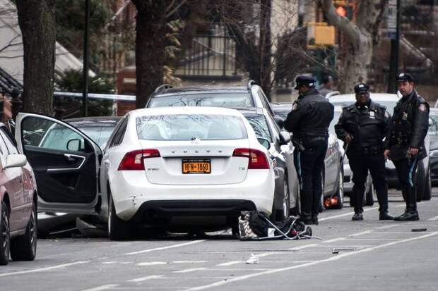 A Volvo sedan, with a stroller pinned under the rear wheel and a shoe on its trunk, crashed on Monday in Brooklyn, leaving two children dead and a pregnant woman injured.