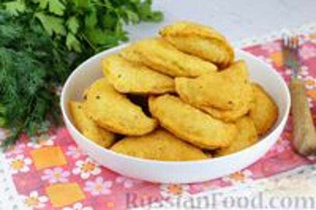 Фото к рецепту: Вареники с капустой и грибами, жаренные во фритюре