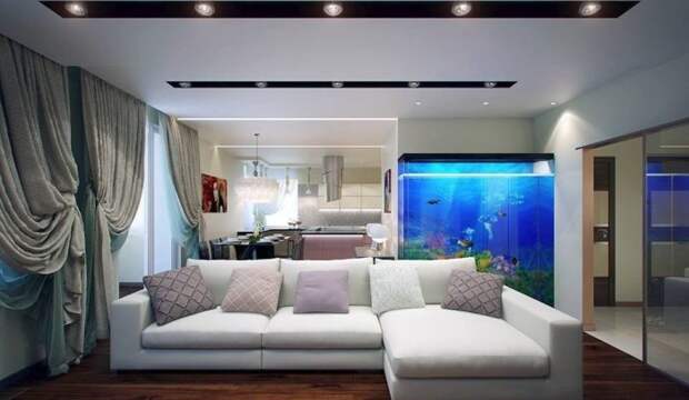 Красивый интерьер гостиной с аквариумом.