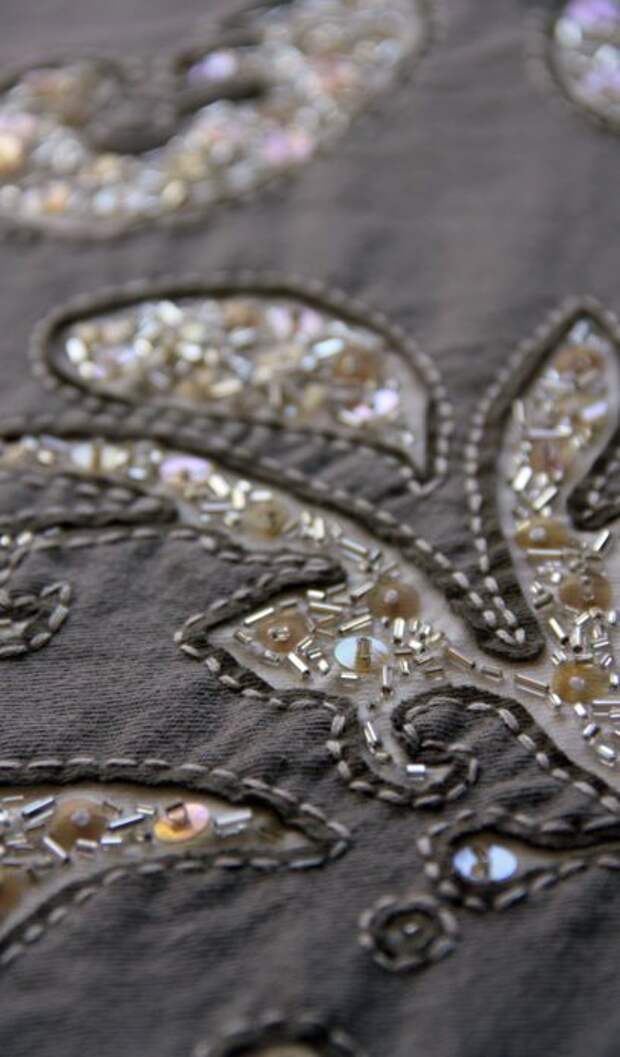 Reverse applique with sequins and beads: 