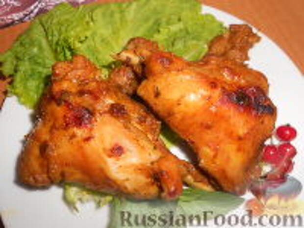 Фото к рецепту: Кролик, тушенный со смородиной