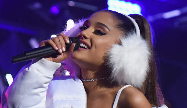 Ariana Grande Got Really Into The Holiday Spirit By Performing In A Bra, Just Like Santa Promised