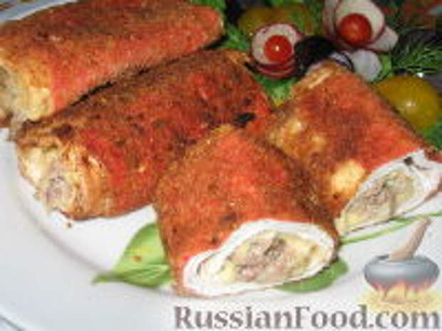 Фото к рецепту: Рулеты из крабовых палочек Фото к рецепту: Рулеты из крабовых палочек