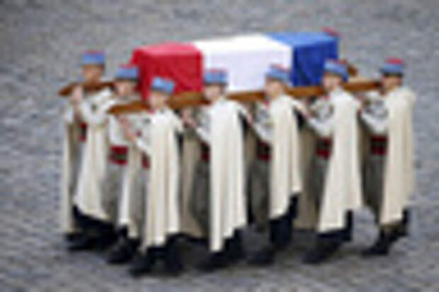 French Foreign Legionnaires carry the coffin of French politician Yves Guena during an official funeral ceremony at the Hotel des Invalides in Paris, France, March 8, 2016 REUTERS/Charles Platiau TPX IMAGES OF THE DAY