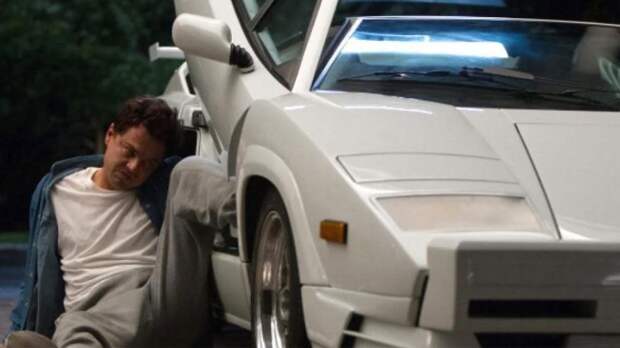 Leonardo DiCaprio next to Lamborghini Countach in Wolf of Wall Street