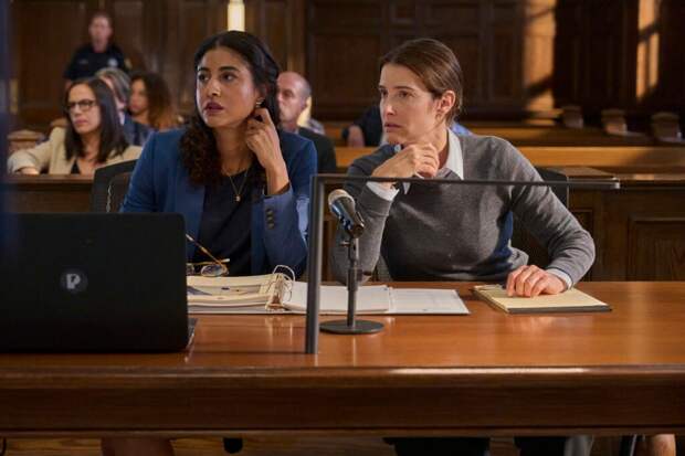 Val is on trial and consults with her attorney.