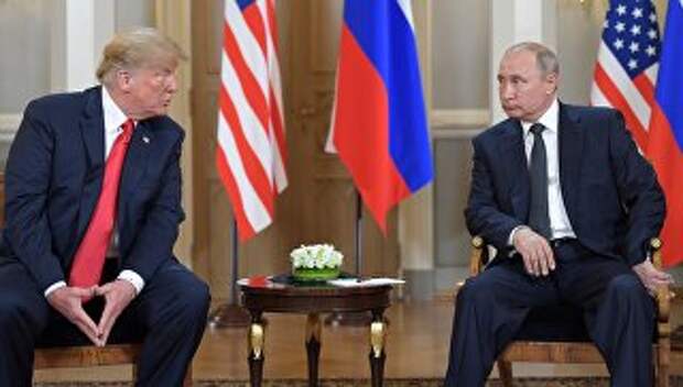 Президент РФ Владимир Путин и президент США Дональд Трамп во время встречи в президентском дворце в Хельсинки. 16 июля 2018
