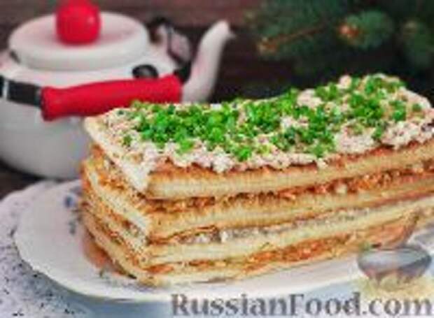 Фото к рецепту: Закусочный торт с консервированной рыбой Фото к рецепту: Закусочный торт с консервированной рыбой