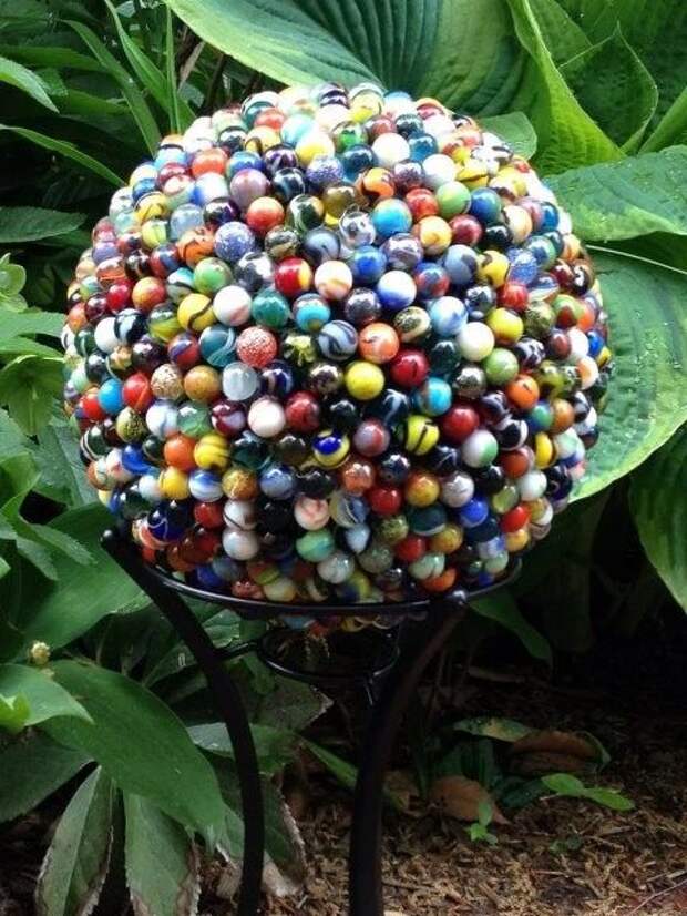 714 marbles + 1 old bowling ball = one really awesome gazing ball