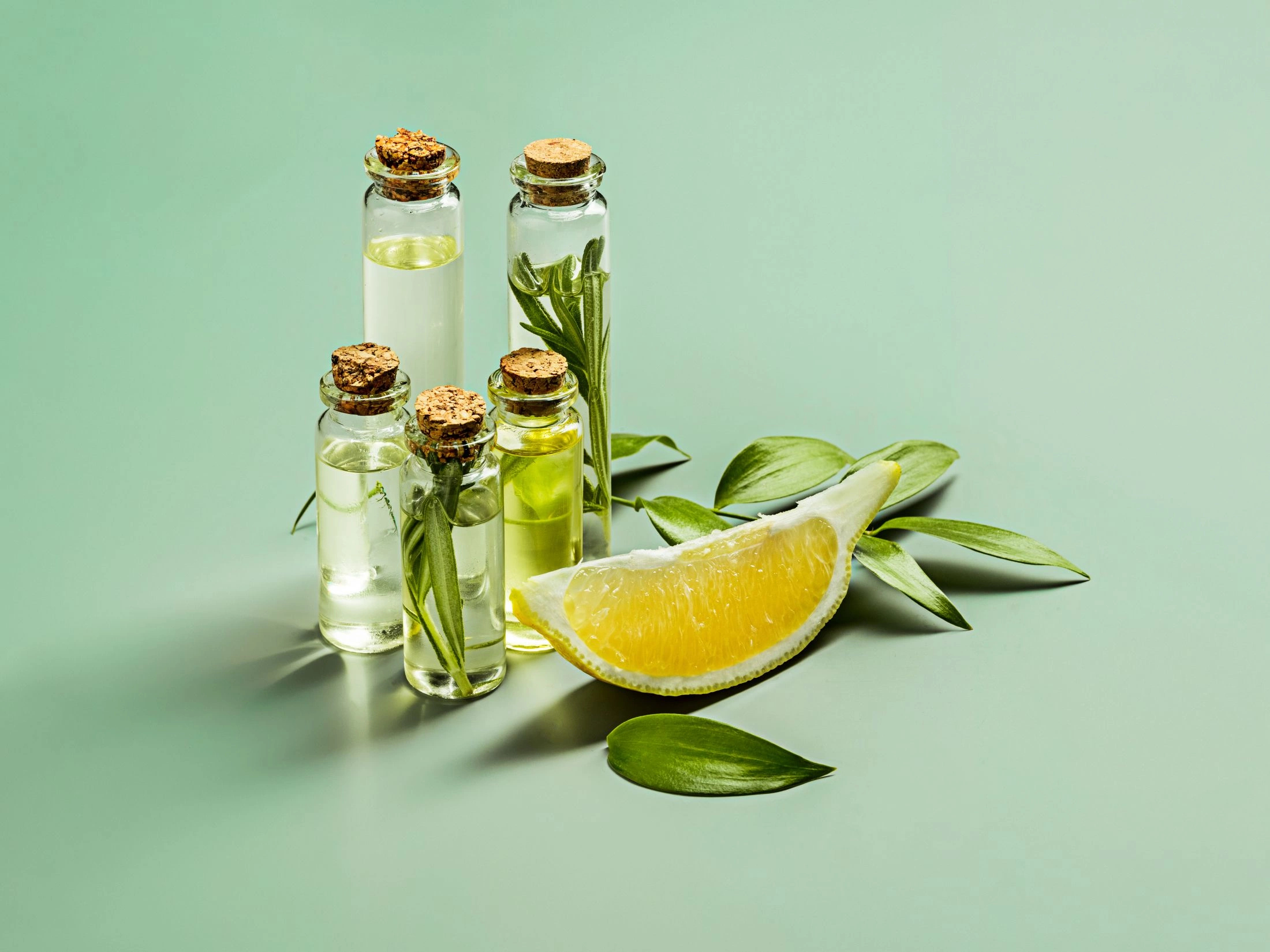 olive-oil-and-olive-branch-on-the-wooden-table.jpg