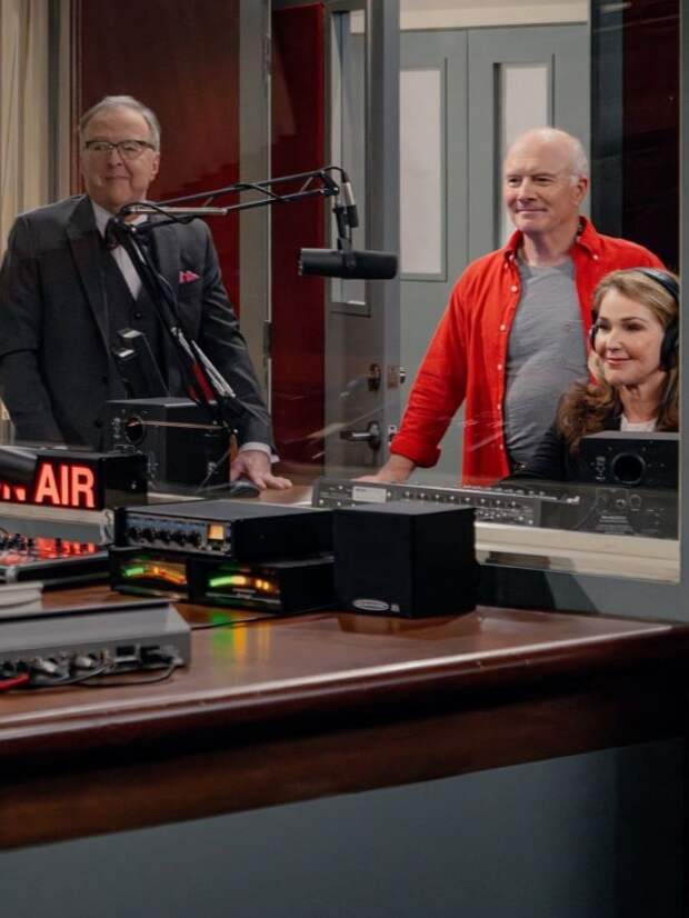Gil Bulldog & Roz stand in the KACL producer's booth
