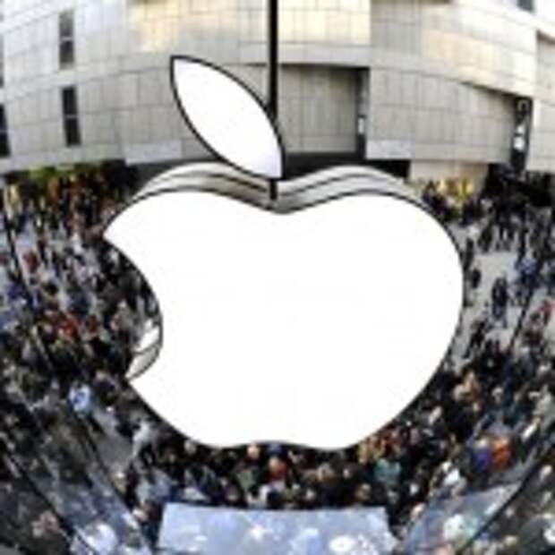 A giant Apple logo can be seen as customers wait for the new Apple iPad 2 in front of the Apple-store in the southern German city of Munich on March 25, 2011. Apple's eagerly-awaited iPad 2 went on sale in 25 countries in Europe, Oceania and the Americas, two weeks after its official launch in the United States. AFP PHOTO / CHRISTOF STACHE (Photo credit should read CHRISTOF STACHE/AFP/Getty Images)