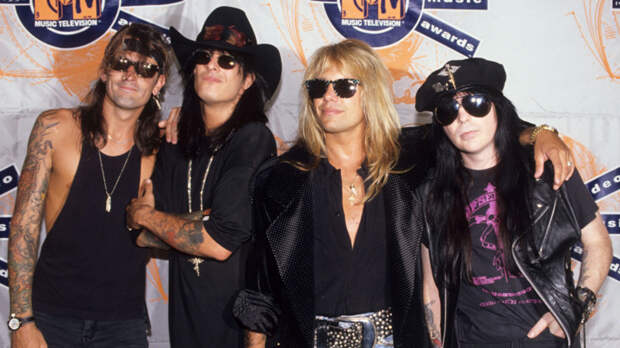 Motley Crue, with Nikki Sixx in a cowboy hat, arrive at the 1990 MTV Video Music Awards.